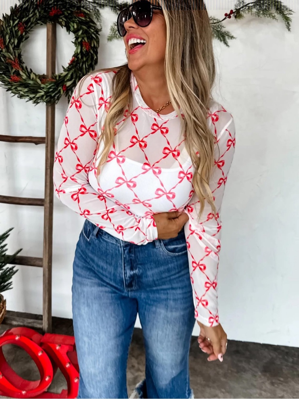 Sheer White Long-Sleeve Mesh Top with Red Bow Print